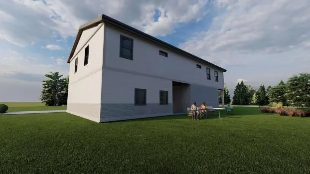 a front view of house with garden