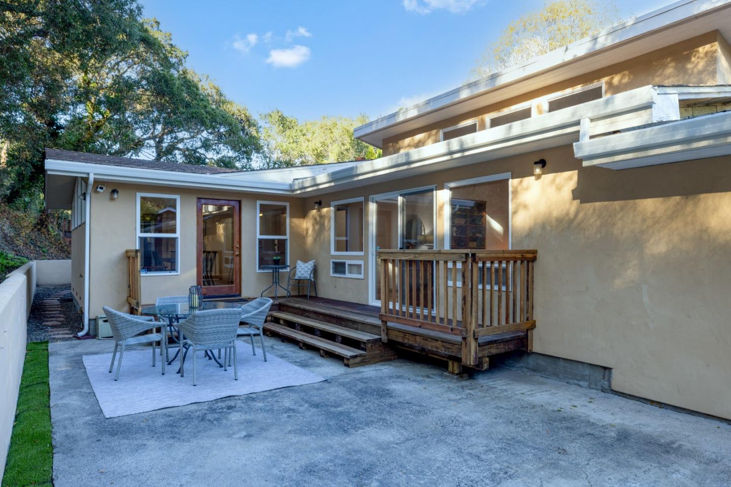 1166 Josselyn Canyon Road Monterey, CA 93940 - Photo 15 of 17 a view of porch with a table and chairs