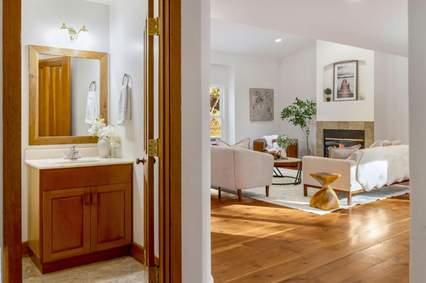 1166 Josselyn Canyon Road Monterey, CA 93940 - Photo 5 of 17 a living room with furniture and a fireplace