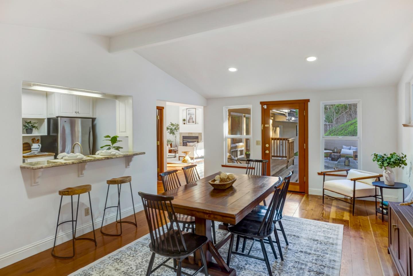 1166 Josselyn Canyon Road Monterey, CA 93940 - Photo 6 of 17 a view of a dining room with furniture and wooden floor