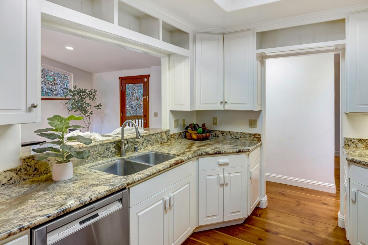 1166 Josselyn Canyon Road Monterey, CA 93940 - Photo 8 of 17 a kitchen with sink and window