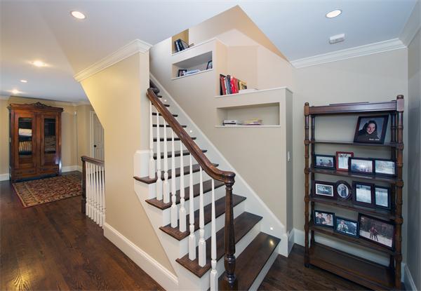 32 Winter Street Weston, MA 02493 - Photo 18 of 23 a view of entryway with wooden floor and stairs