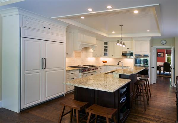 32 Winter Street Weston, MA 02493 - Photo 6 of 23 a kitchen with counter and chairs
