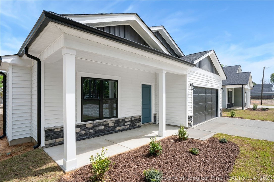 4043 Church Street Wade, NC 28395 - Photo 2 of 28 a view of a house with porch