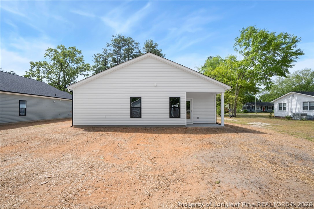 4043 Church Street Wade, NC 28395 - Photo 24 of 28 a view of a house with a yard