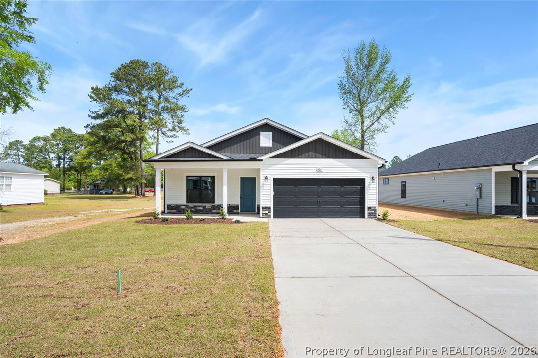 4043 Church Street Wade, NC 28395 - Photo 27 of 28 a front view of a house with yard