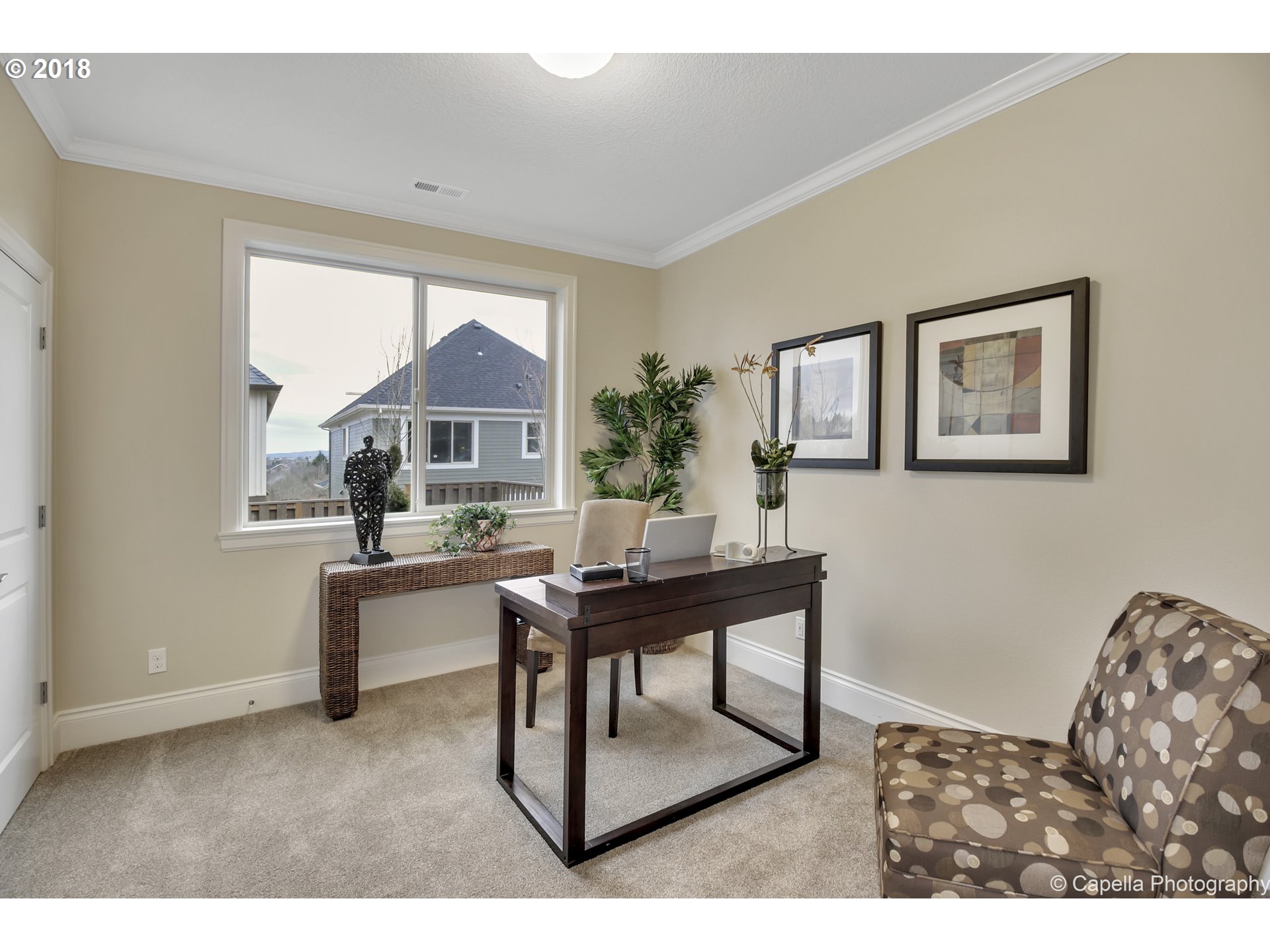 4178 Northwest Ashbrook Drive Portland, OR 97229 - Photo 14 of 20 a living room with furniture a table and a large window