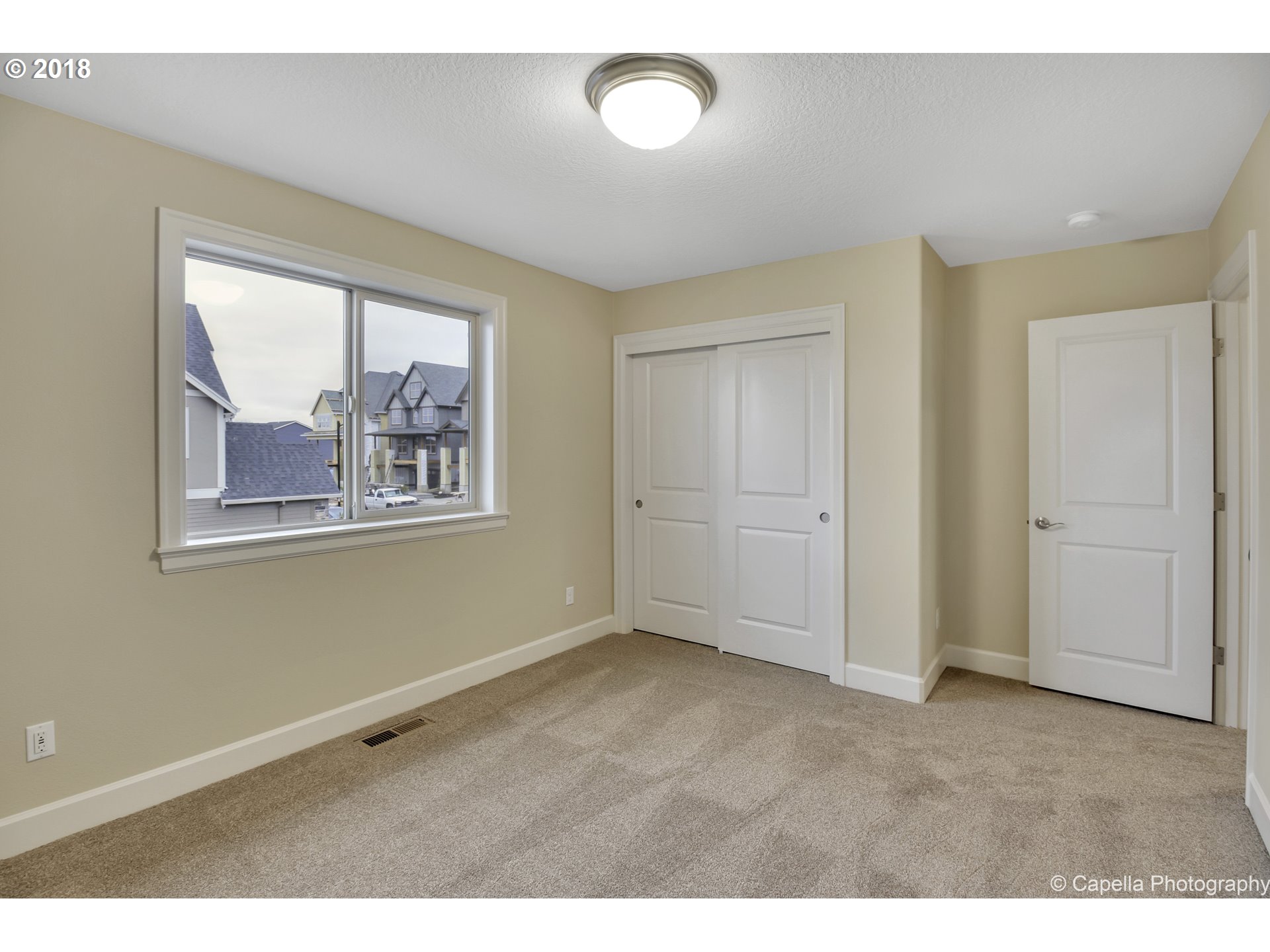 4178 Northwest Ashbrook Drive Portland, OR 97229 - Photo 18 of 20 a view of empty room with window