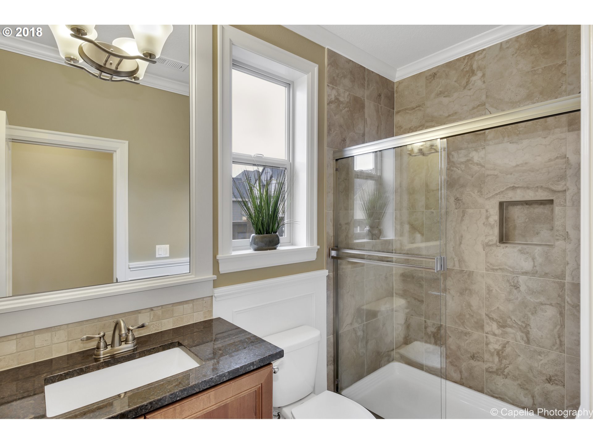 4178 Northwest Ashbrook Drive Portland, OR 97229 - Photo 10 of 20 a bathroom with a sink and a mirror
