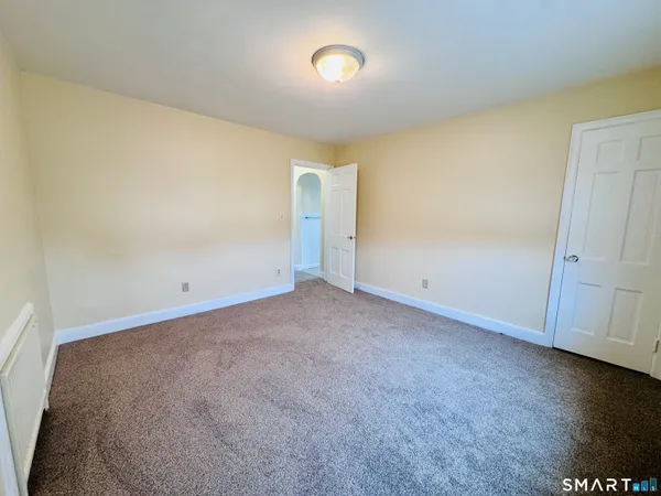 an empty room with a door