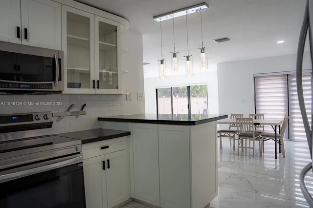 a view of a large window with an outdoor view