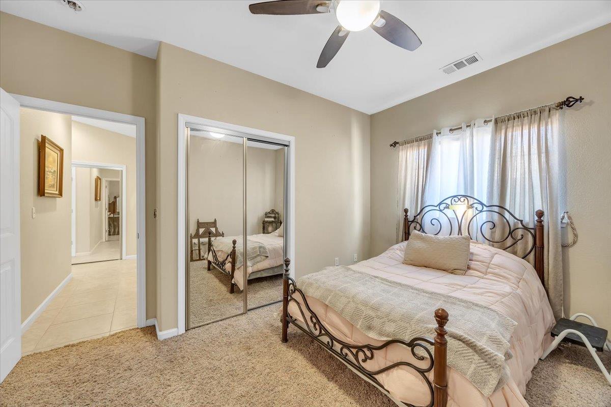 411 Sunrise Road Copperopolis, CA 95228 - Photo 44 of 76 Guest rooms are at the back of the home, offering privacy for the primary suite.