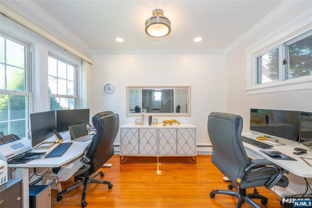 690 Garden Street Maywood, NJ 07607 - Photo 9 of 49 a view of a workspace with furniture and a window