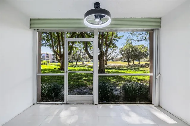 a view of swimming pool from a window