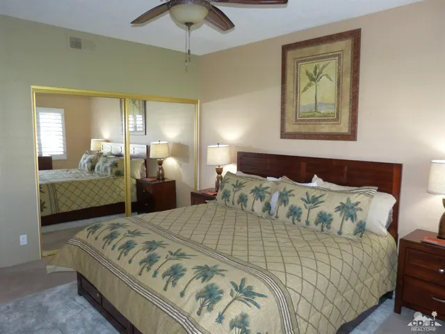 a view of a dining room with furniture and window