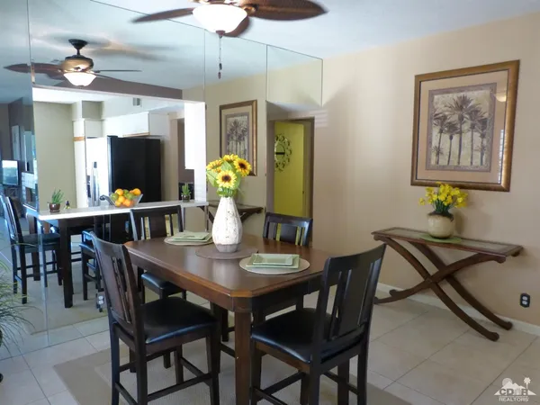 a view of a dining room with furniture