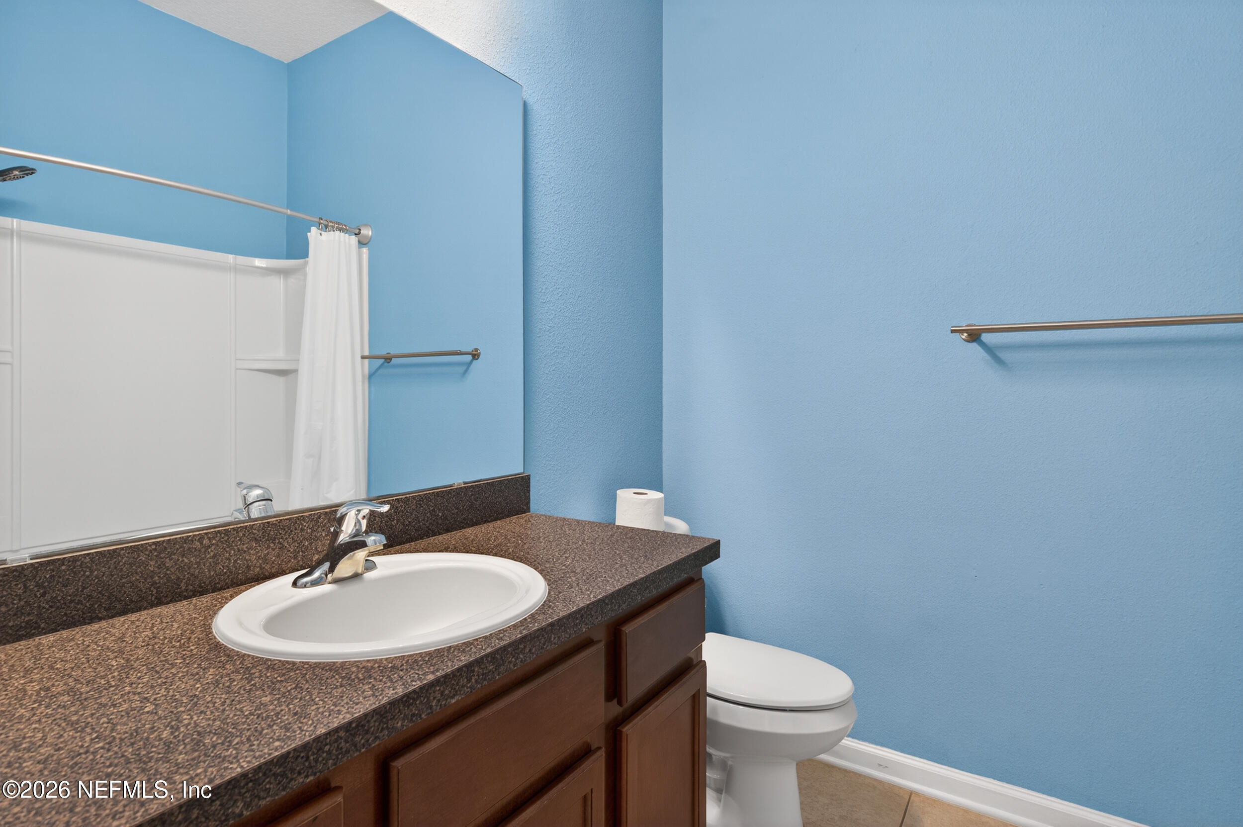 319 Golden Lake Loop St. Augustine, FL 32084 - Photo 8 of 15 a bathroom with a sink and a toilet