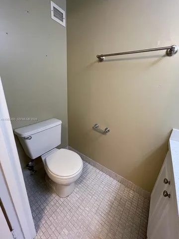 a view of swimming pool from a balcony