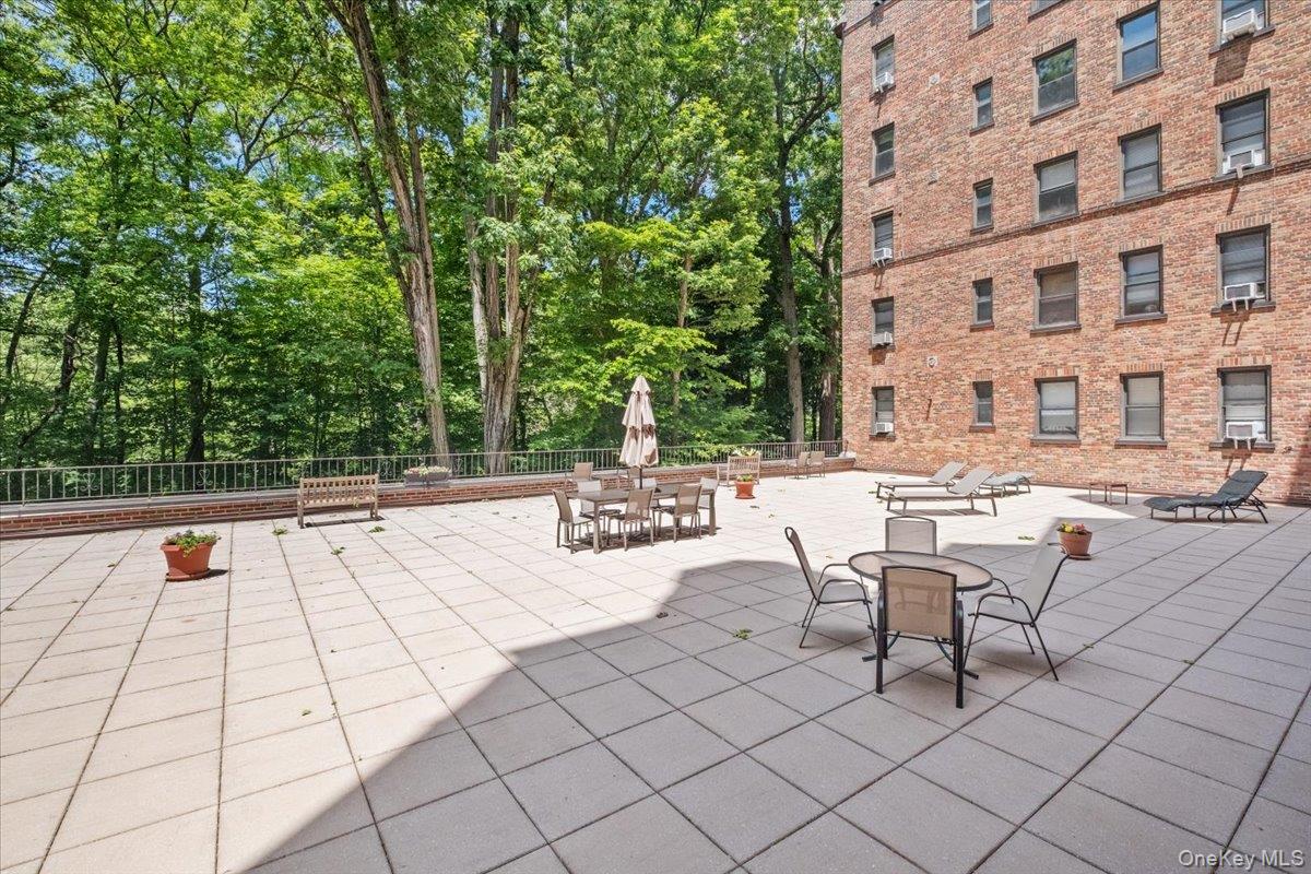 143 Garth Road, Unit 5L Scarsdale, NY 10583 - Photo 20 of 22 Patio overlooks Garth Woods
