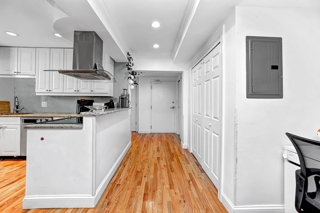16 Addington Road, Unit 23 Brookline, MA 02445 - Photo 7 of 21 a view of kitchen with stainless steel appliances refrigerator stove microwave and cabinets