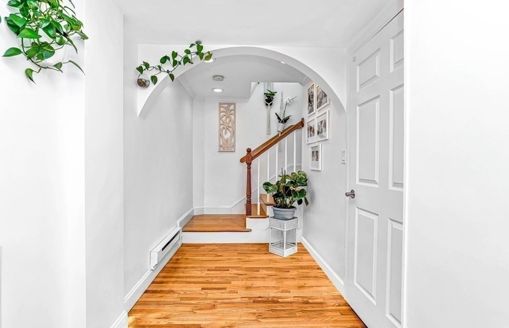 16 Addington Road, Unit 23 Brookline, MA 02445 - Photo 9 of 21 a view of entryway with flower pots