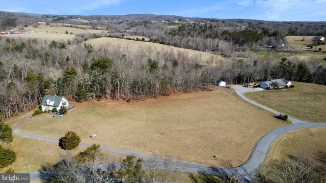a view of a dry yard with mountain