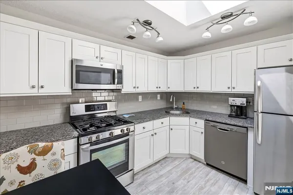 $489,000 | 1150 River Road, Unit PHB, Edgewater, NJ 07020