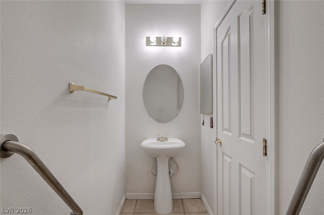 1479 Orange Jubilee Road Henderson, NV 89014 - Photo 14 of 36 A compact and functional lavatory provides essential convenience for guests.