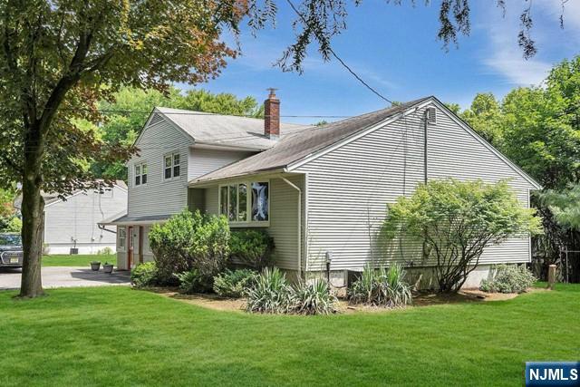 516 Knickerbocker Road Cresskill, NJ 07626 - Photo 27 of 31 a view of a house with a yard