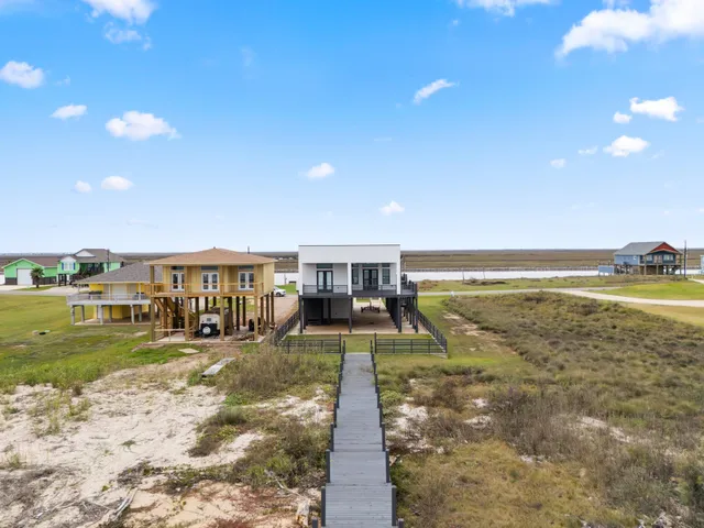 a view of a balcony with ocean view