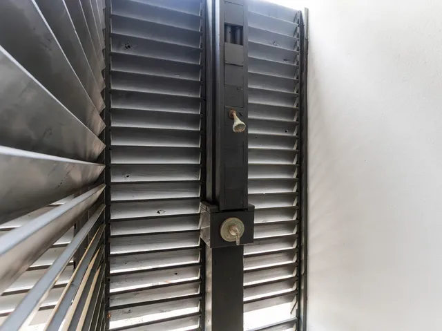 a view of staircase with lots of wooden furniture
