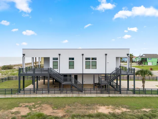 a view of a swimming pool with an ocean view