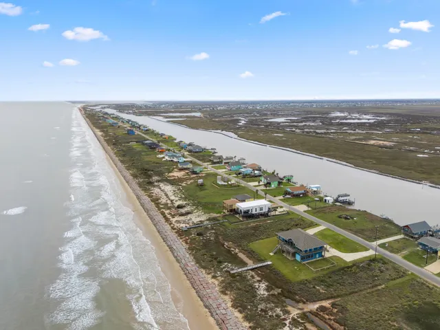 a view of swimming pool with outdoor seating