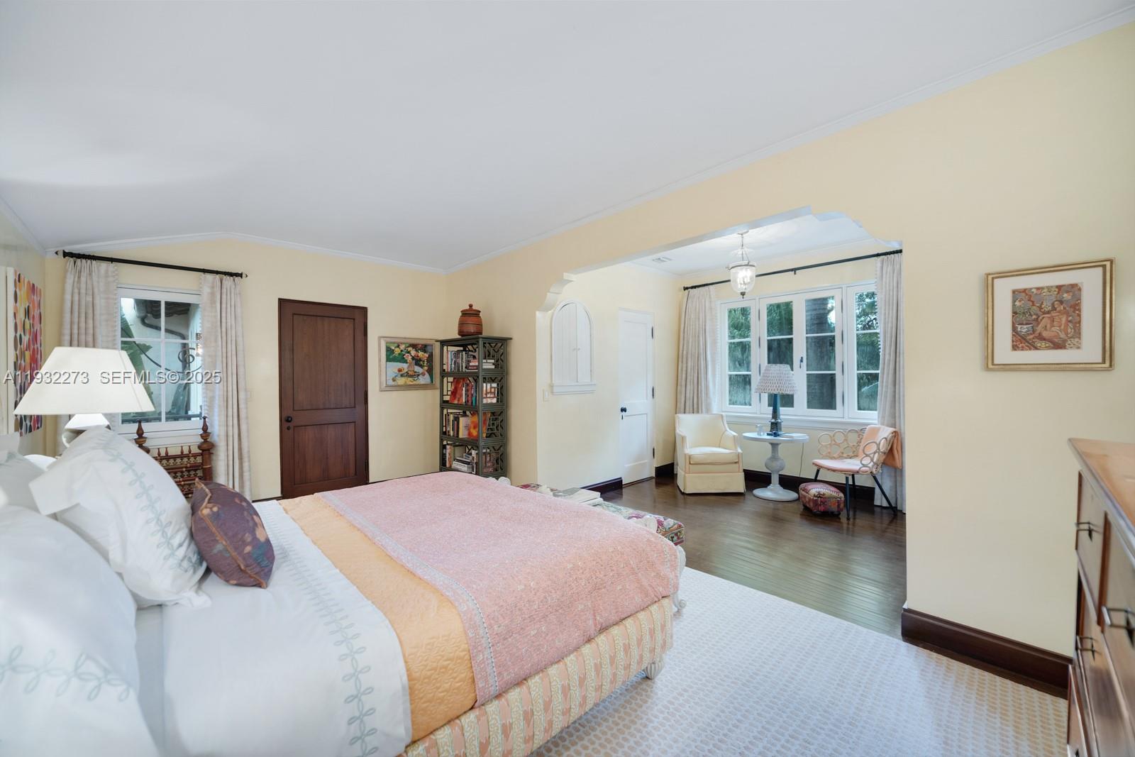 3467 North Moorings Way Miami, FL 33133 - Photo 14 of 25 a bed room with a bed and a couch