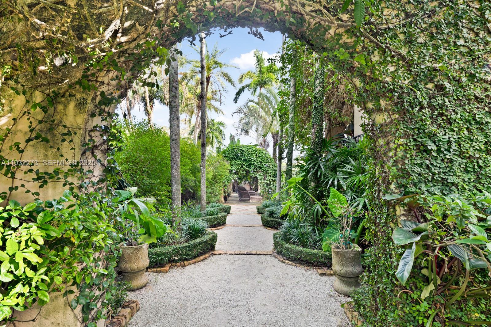 3467 North Moorings Way Miami, FL 33133 - Photo 20 of 25 a view of a pathway of a yard