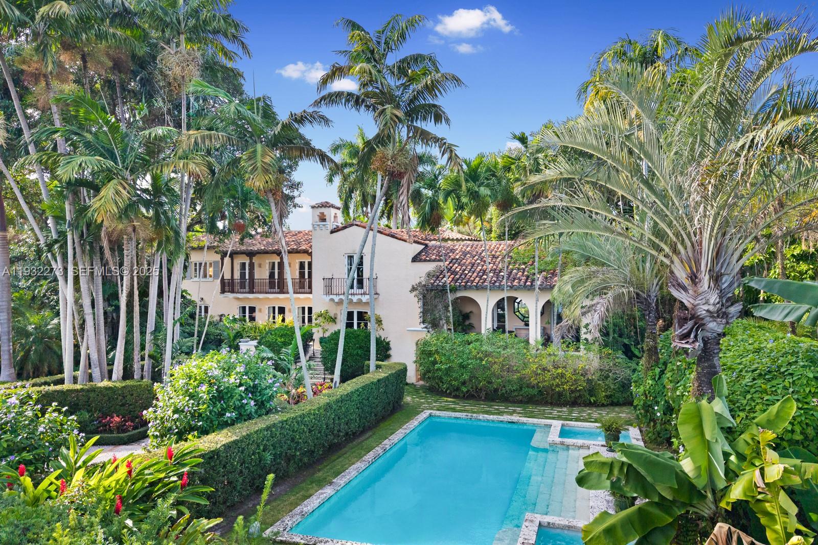 3467 North Moorings Way Miami, FL 33133 - Photo 2 of 25 a view of a house with a garden