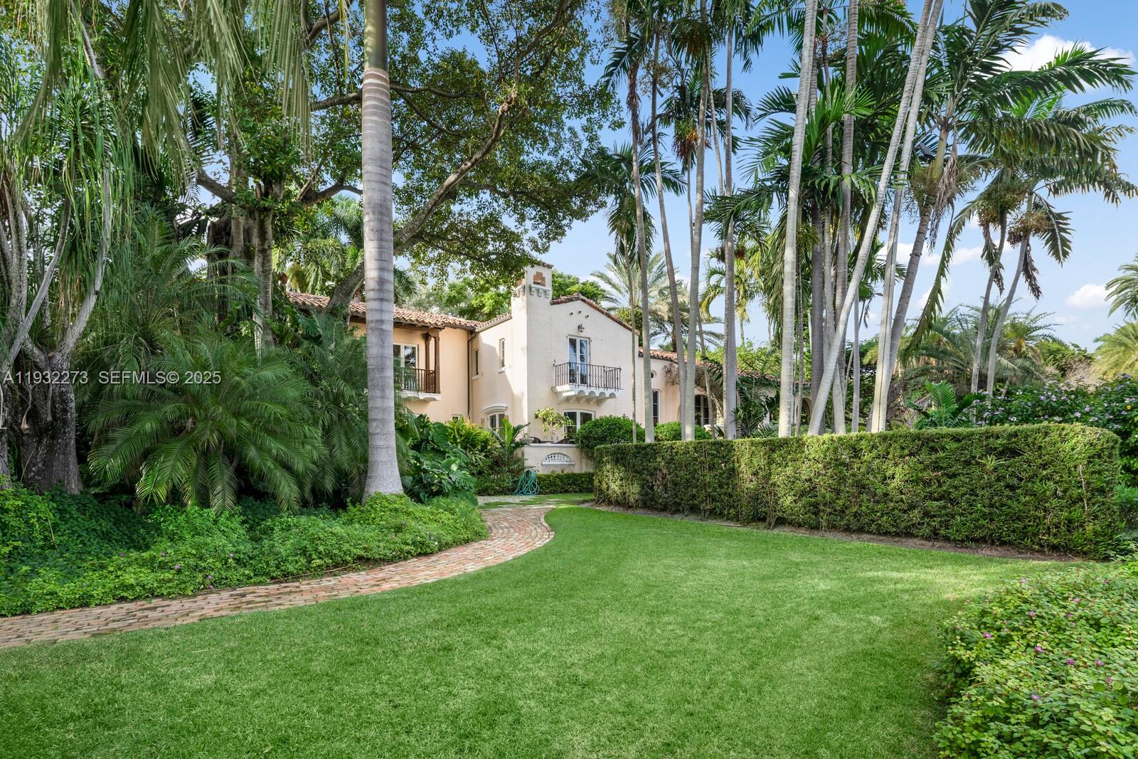3467 North Moorings Way Miami, FL 33133 - Photo 22 of 25 a view of a yard in front of a house