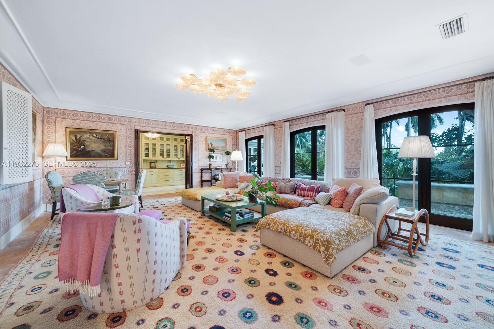 3467 North Moorings Way Miami, FL 33133 - Photo 5 of 25 a living room with furniture and a large window