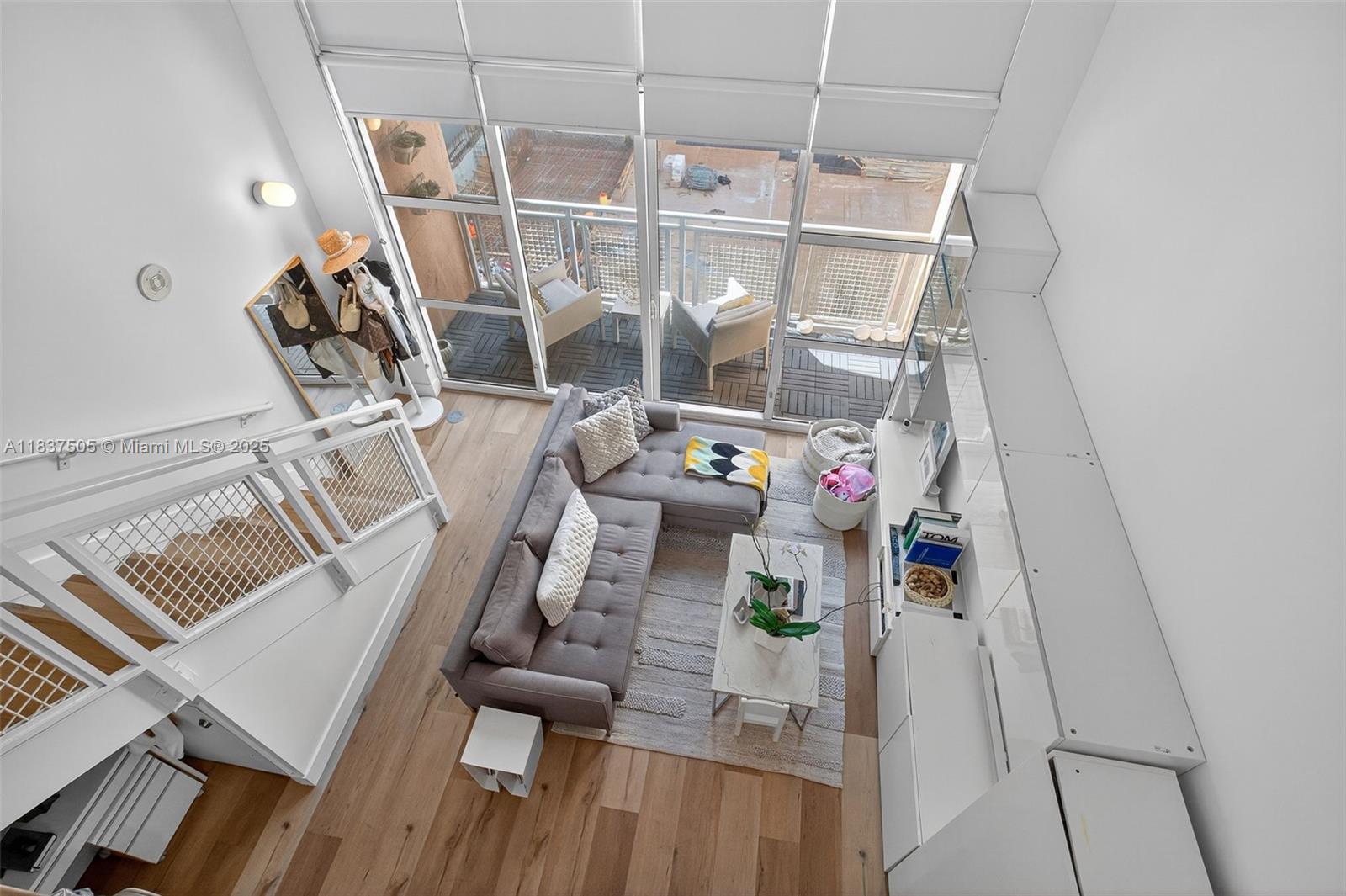 244 Biscayne Boulevard, Unit 446 Miami, FL 33132 - Photo 17 of 22 a view of living room with furniture and decor