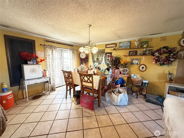 a group of people sitting in a living room