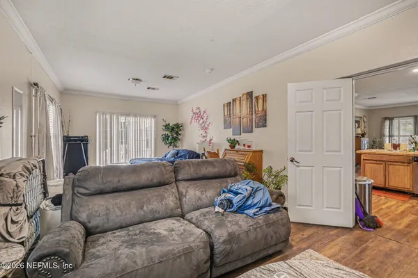 a living room with furniture and a window