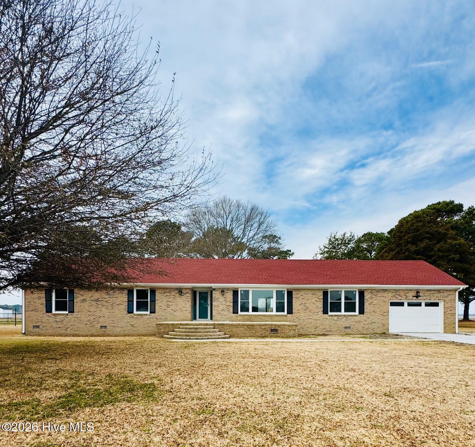 Newer roof, new windows, new shutters, new garage door, totally renovated!