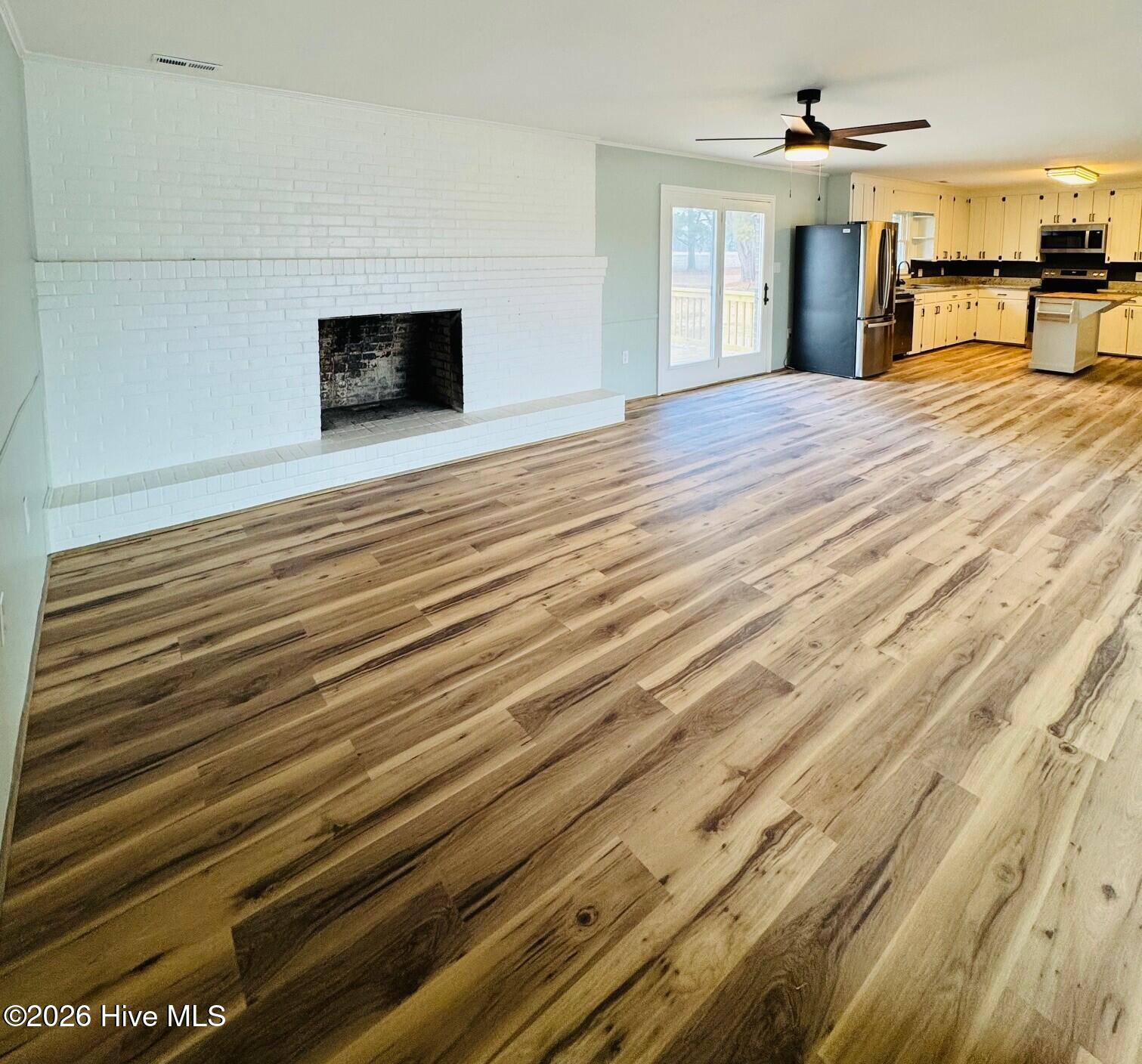 310 Old Swamp Road South Mills, NC 27976 - Photo 18 of 25 Firplace to deck to kitchen