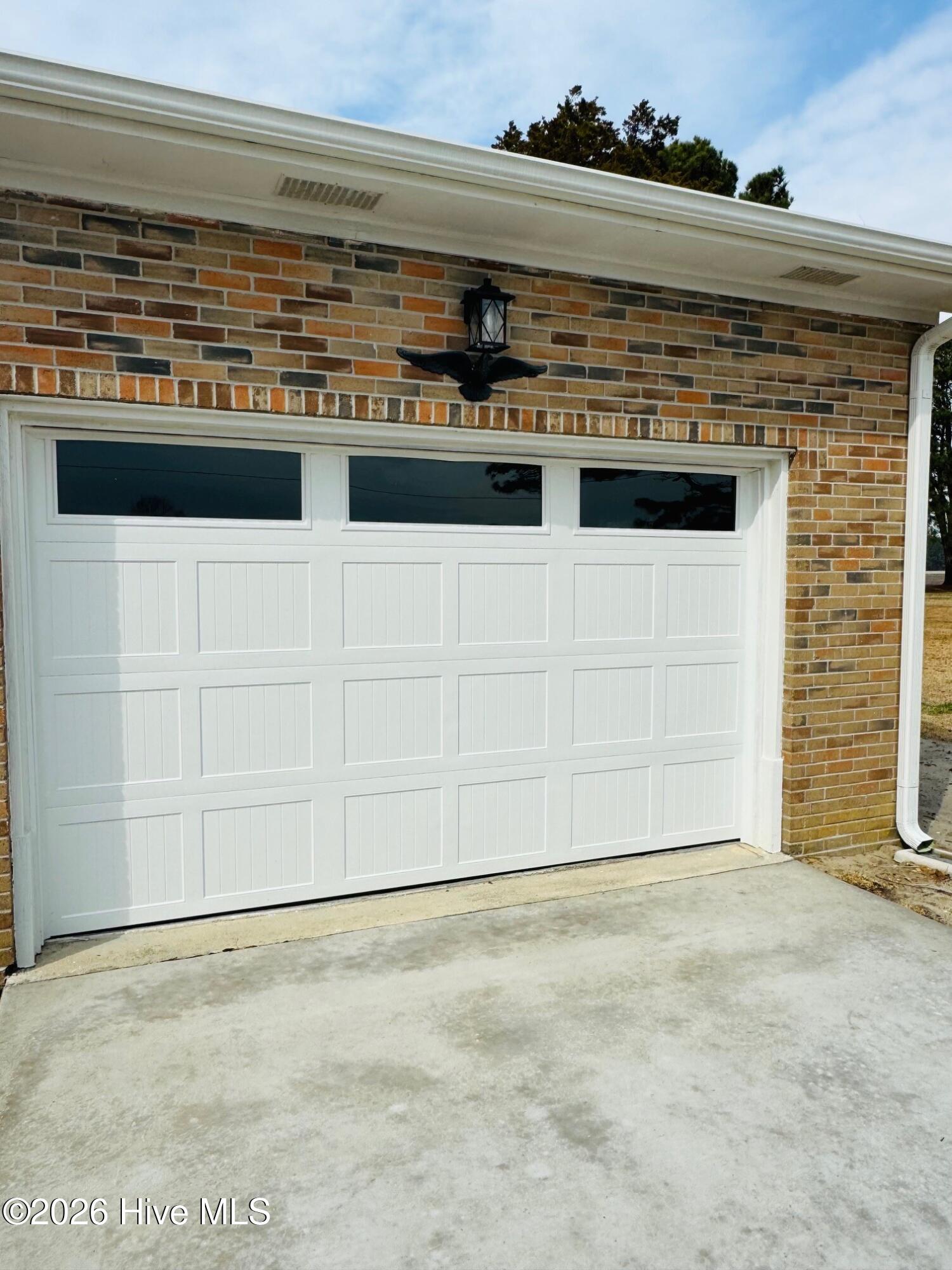 310 Old Swamp Road South Mills, NC 27976 - Photo 22 of 25 New garage door