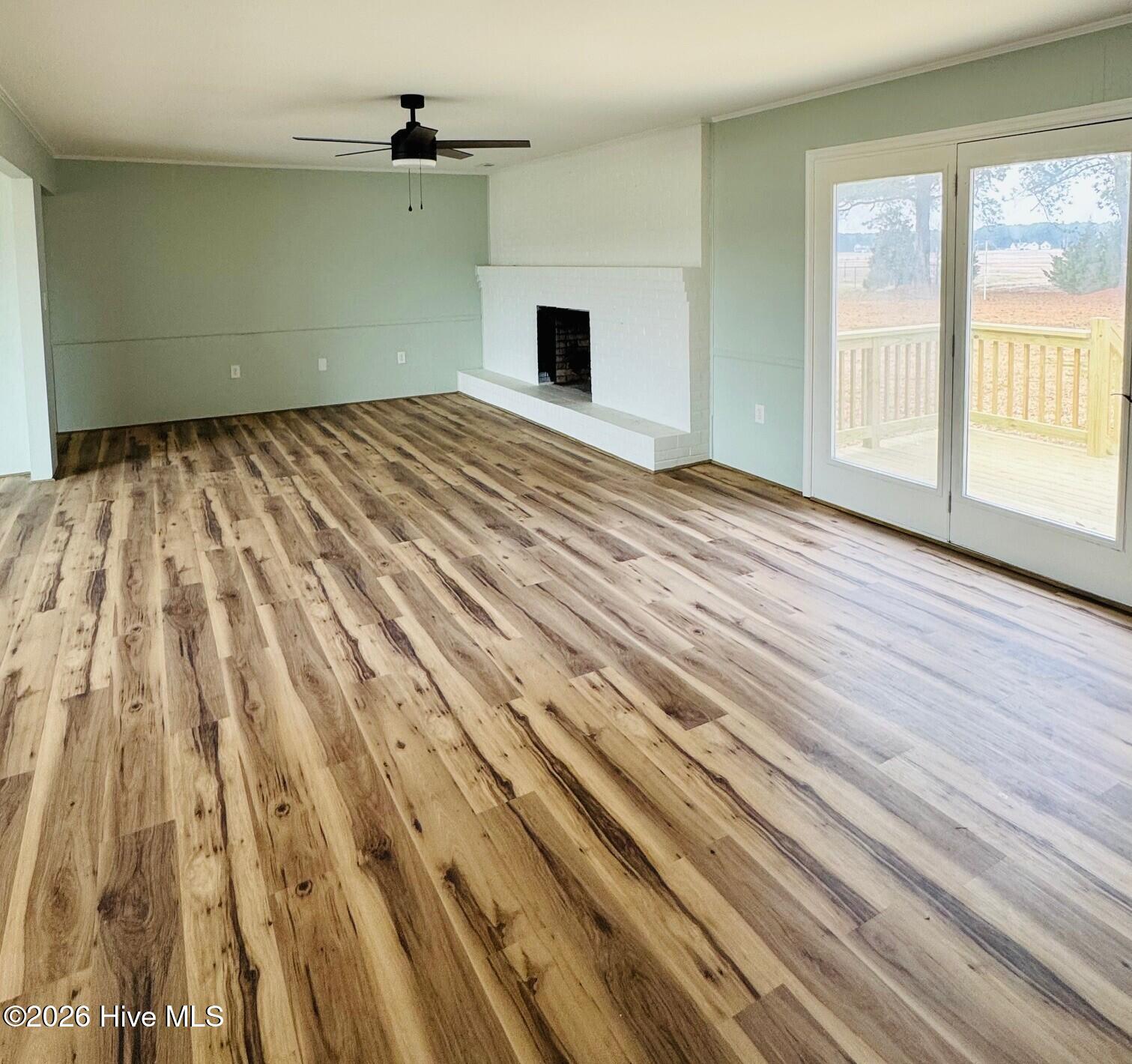 310 Old Swamp Road South Mills, NC 27976 - Photo 5 of 25 Living to deck and fireplace