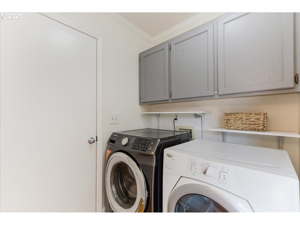 7505 Southwest Alpine Drive Beaverton, OR 97008 - Photo 20 of 48 a utility room with dryer and washer