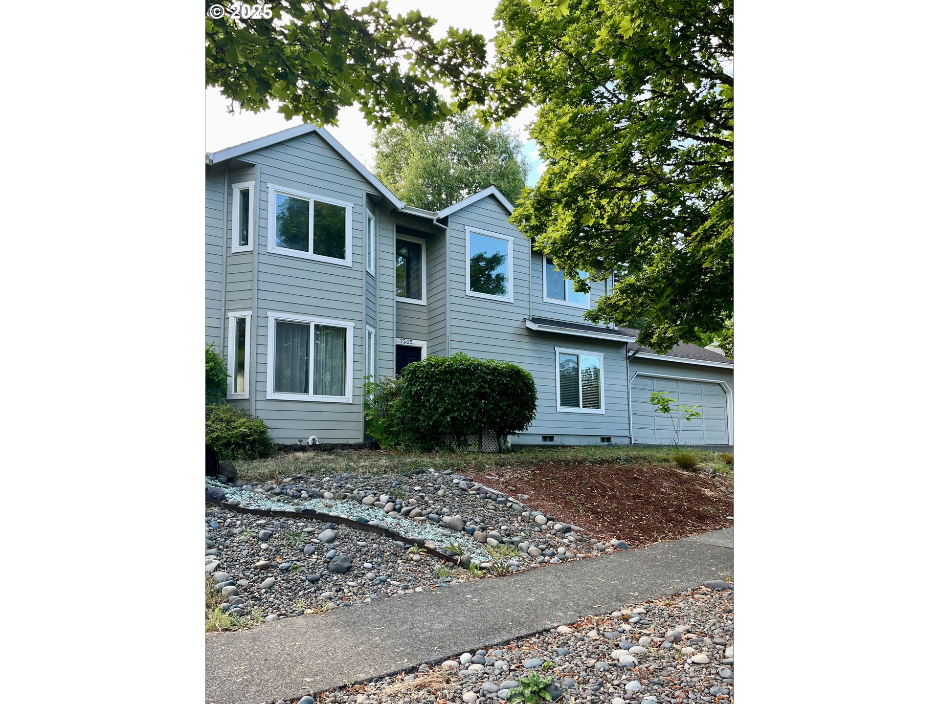 7505 Southwest Alpine Drive Beaverton, OR 97008 - Photo 2 of 48 a view of a house with a yard and large tree