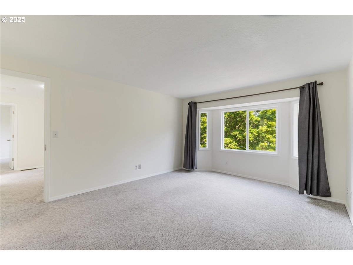 7505 Southwest Alpine Drive Beaverton, OR 97008 - Photo 24 of 48 a view of an empty room with a window
