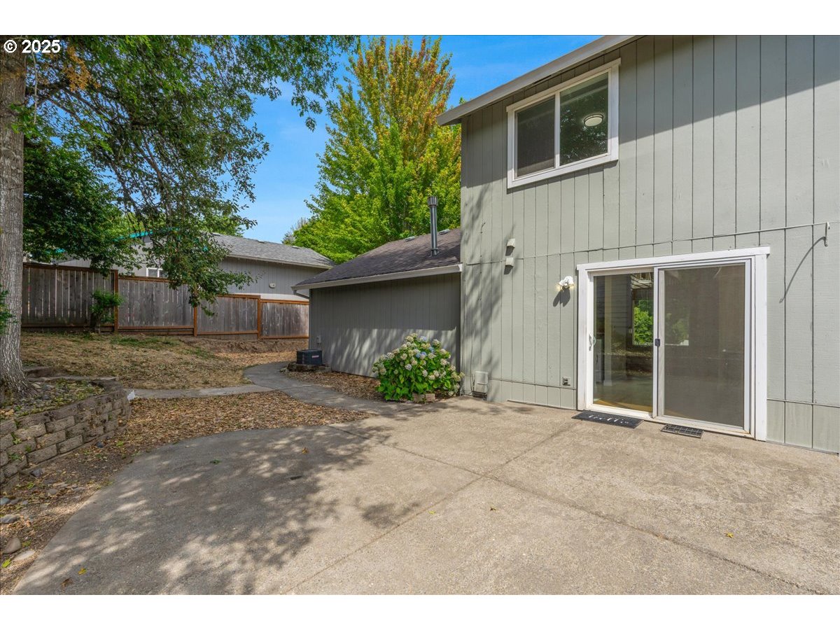 7505 Southwest Alpine Drive Beaverton, OR 97008 - Photo 32 of 48 a view of a house with a backyard