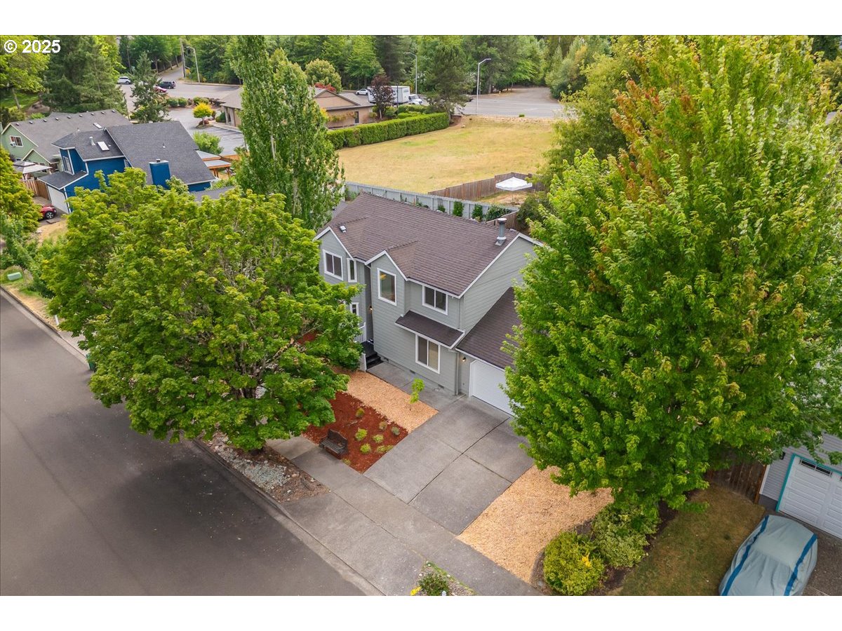 7505 Southwest Alpine Drive Beaverton, OR 97008 - Photo 42 of 48 an aerial view of a house with a yard and lake view